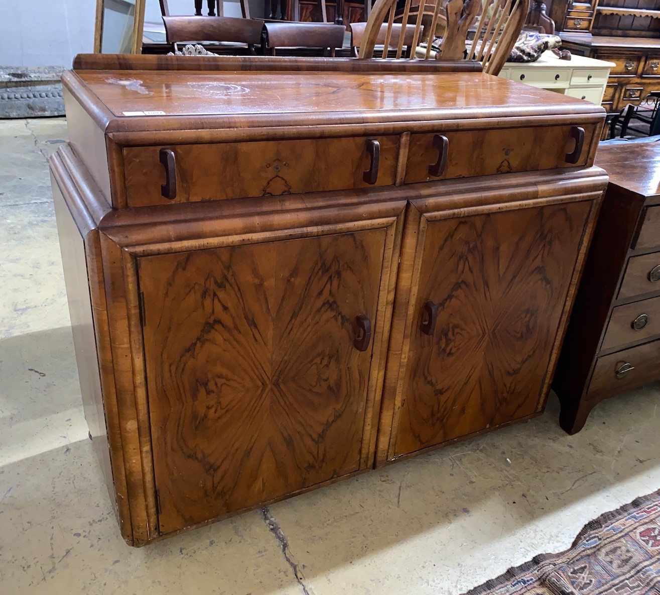 An Art Deco style Australian walnut sideboard, length 120cm, depth 48cm, height 96cm